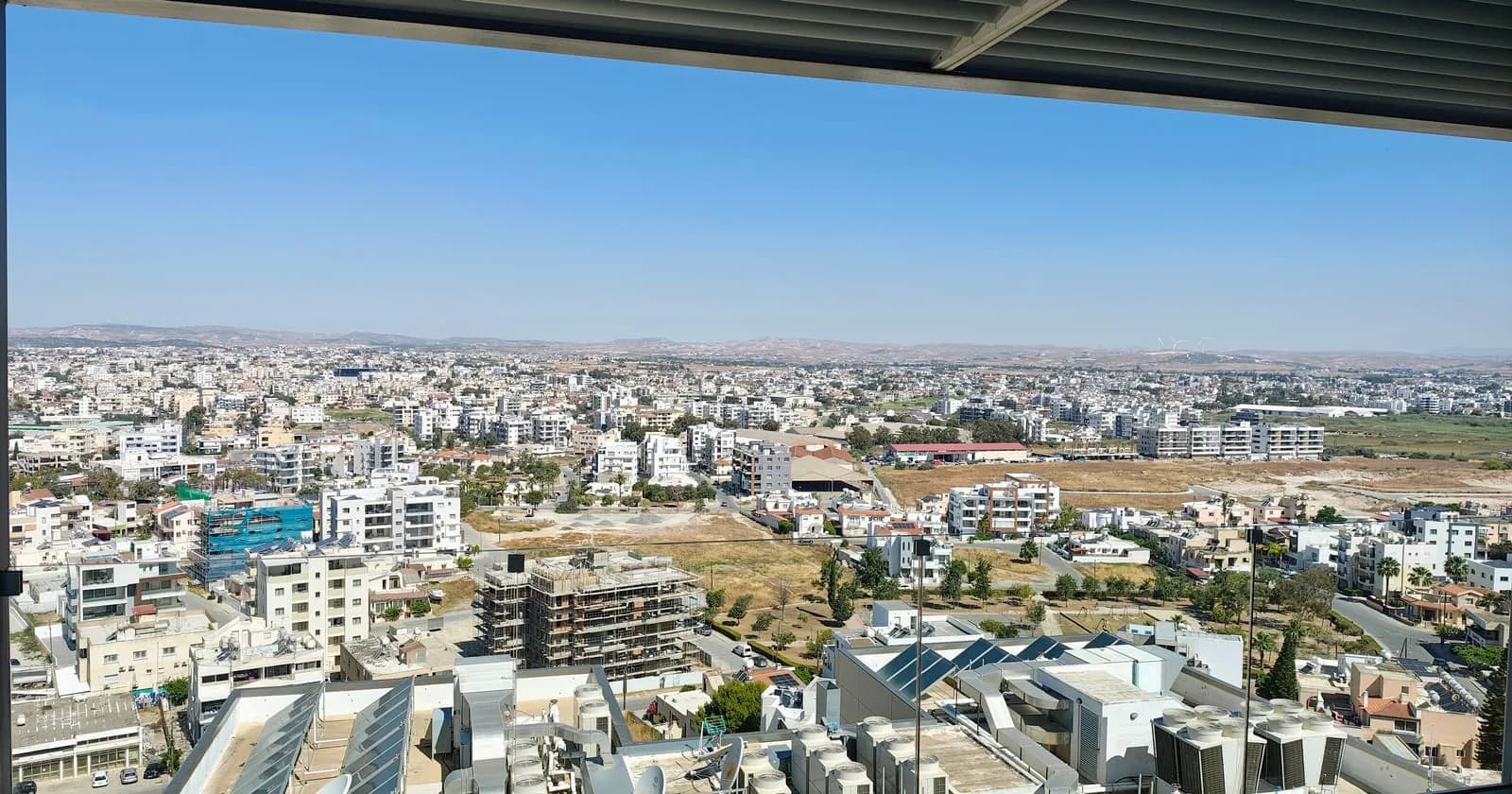 Larnaca, Cyprus, panoramic view over the city rooftops toward the Mediterranean